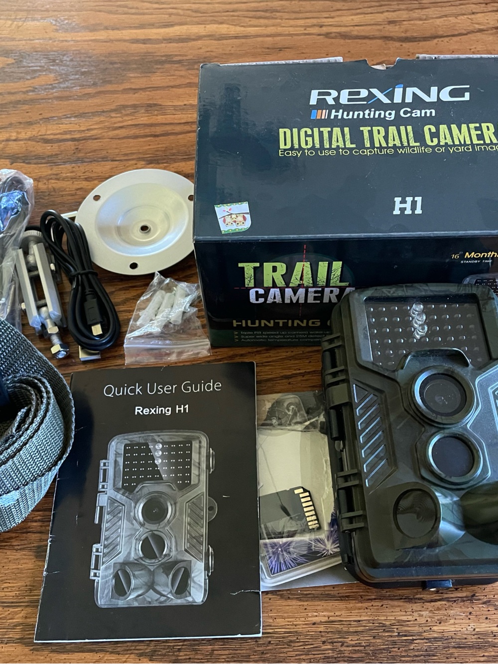 Rexing H1 Digital Trail Camera Box in Black with Yellow Text